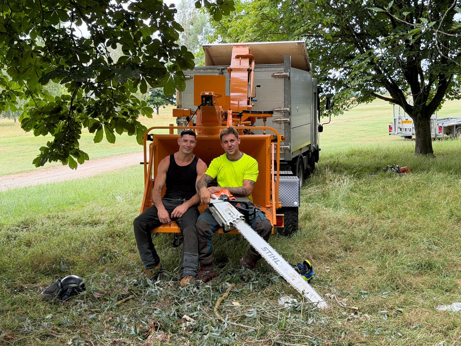 The All Arboricultural Trees team on-site with chainsaw and woodchipper